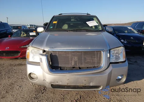 2006 GMC Envoy Denali z USA, uszkodzony, nr VIN 1GKES63M262121664